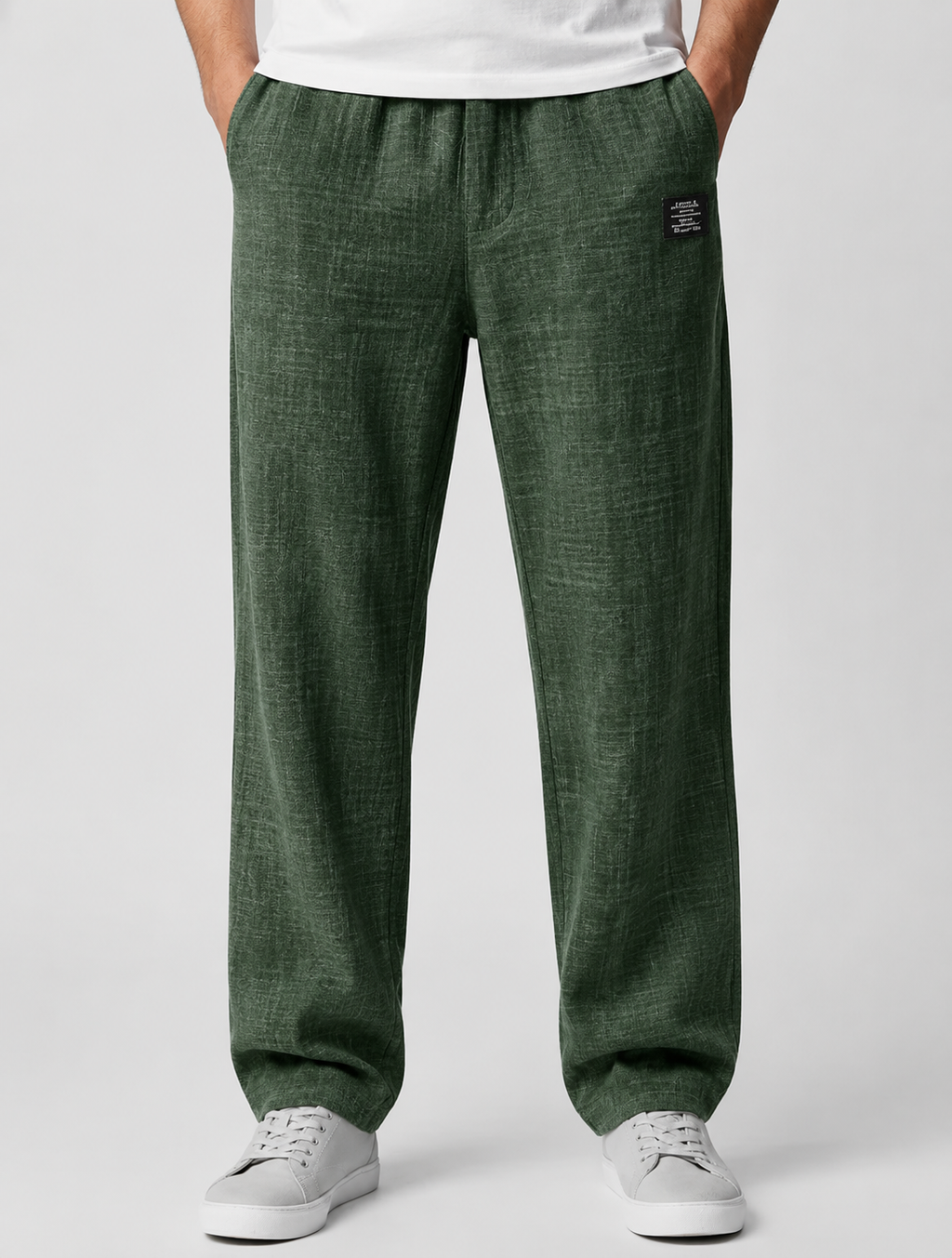 All five colour options of men's casual trousers laid out side by side