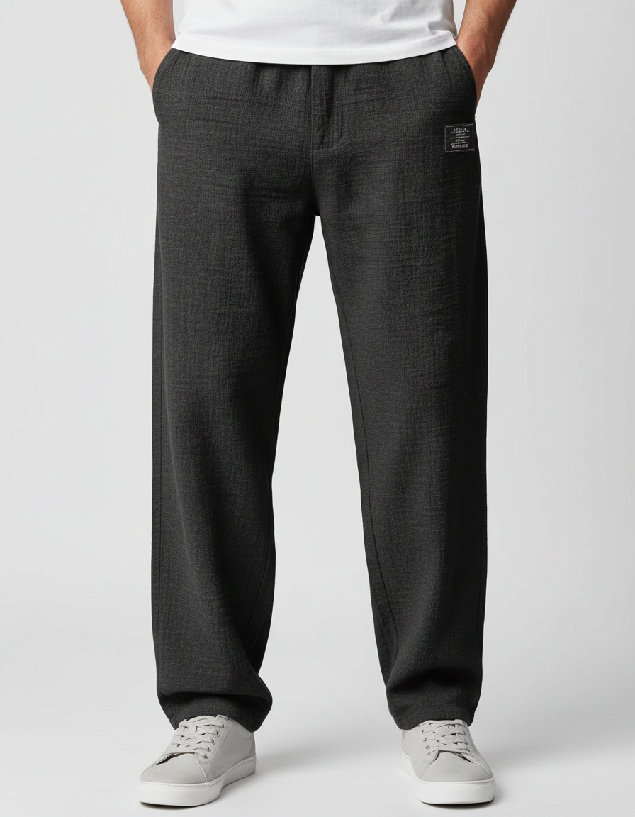 Men's casual trousers in black with relaxed fit and button-zip fastening, front view