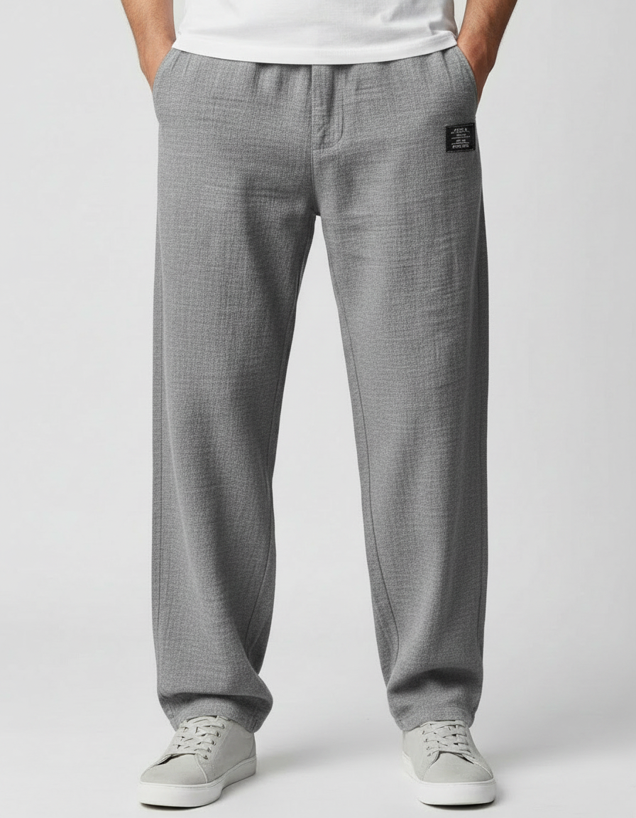 Close-up of button and zip fastening on men's casual trousers in khaki